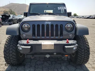 2016 Jeep Wrangler Rubicon z VIN 1C4BJWCG3GL275971, wystawiony jako Copart lot #60329125 z przebiegiem 25 956 mil mil oraz Szkoda całkowita • Salvage title. Historia ofert i sprzedaży dostępna na DreamBid. Obrazek 5.
