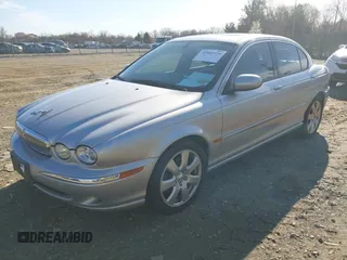 2004 Jaguar X-Type with VIN SAJEA51C94WD62540, listed as a IAAI auction lot 41864020 with 85,713 mi miles. Bid and sale history available at carsss.com. Image 2.
