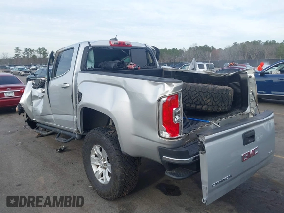 2016 GMC Canyon 2WD SLE with VIN 1GTG5CE34G1252553, listed as a IAAI auction lot 41609585 with 128,720 mi miles. Bid and sale history available at carsss.com. Image 3.