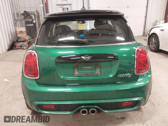 2020 MINI Hardtop Cooper S z VIN WMWXR5C01L2L36999, wystawiony jako IAAI lot #41404558 z przebiegiem 24 930 mil mil oraz . Historia ofert i sprzedaży dostępna na DreamBid. Obrazek 17.