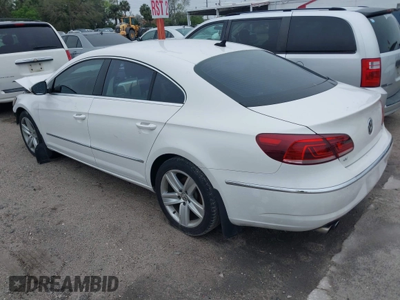2013 Volkswagen CC Sport Plus z VIN WVWBP7AN6DE557611, wystawiony jako IAAI lot #41663021 z przebiegiem 130 393 mil mil oraz . Historia ofert i sprzedaży dostępna na DreamBid. Obrazek 3.