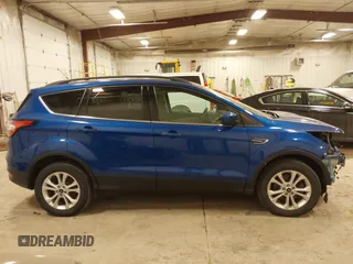2018 Ford Escape SE with VIN 1FMCU9GD4JUA83470, listed as a IAAI auction lot 41272882 with 105,661 mi miles. Bid and sale history available at carsss.com. Image 13.