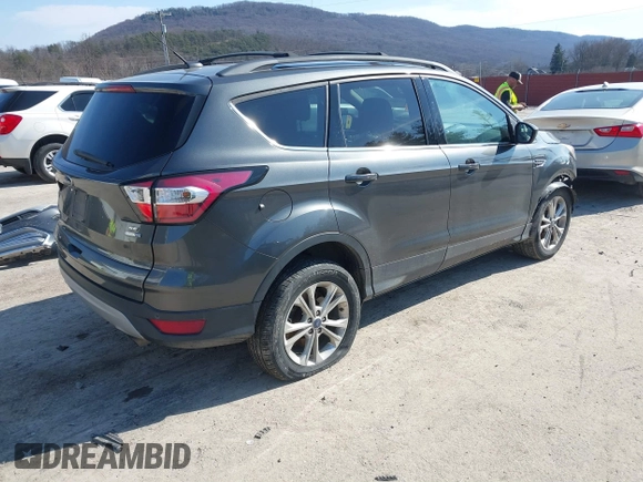2017 Ford Escape SE with VIN 1FMCU9G99HUD03370, listed as a IAAI auction lot 41700809 with 136,575 mi miles. Bid and sale history available at carsss.com. Image 4.