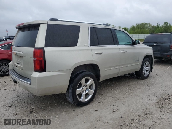2015 Chevrolet Tahoe LTZ z VIN 1GNSKCKC5FR100084, wystawiony jako Copart lot #57677825 z przebiegiem 141 987 mil mil oraz Czysty tytuł • Clean title. Historia ofert i sprzedaży dostępna na DreamBid. Obrazek 3.