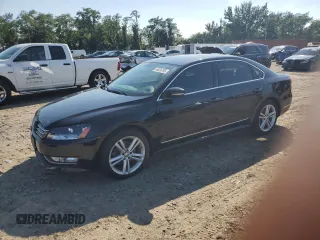 2014 Volkswagen Passat SEL Premium with VIN 1VWCN7A33EC022772, listed as a Copart auction lot 65826795 with Not provided miles and Clean title. Bid and sale history available at DreamBid. Image 1.