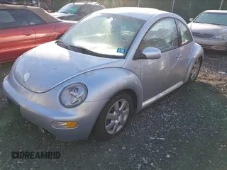 2003 Volkswagen New Beetle Coupe GLX with VIN 3VWDD21C93M424270, listed as a IAAI auction lot 41360819 with 999,999 mi miles. Bid and sale history available at carsss.com. Image 2.