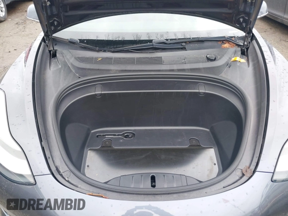 2019 Tesla Model 3 Mid Range with VIN 5YJ3E1EA3KF307415, listed as a IAAI auction lot 41673239 with 42,895 mi miles and . Bid and sale history available at DreamBid. Image 10.