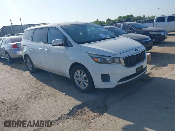 2015 Kia Sedona LX with VIN KNDMB5C10F6027850, listed as a IAAI auction lot 42010344 with 127,019 mi miles. Bid and sale history available at carsss.com. Image 1.
