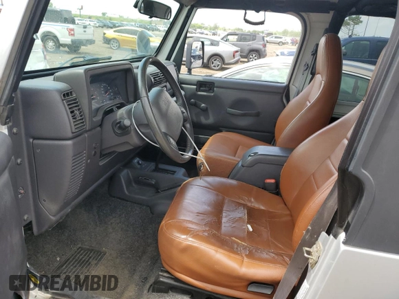 2002 Jeep Wrangler X с VIN 1J4FA39S52P770423, выставлен на аукционе Copart как лот 62498885 с пробегом 87 433 миль миль и Чистый • Clean title. История ставок и продаж доступна на DreamBid. Изображение 7.