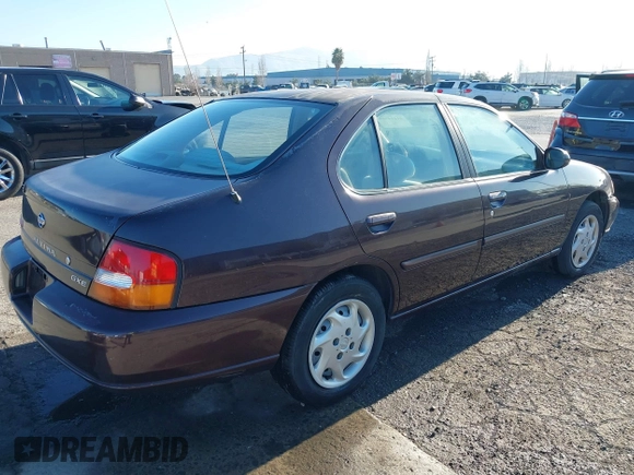 1999 Nissan Altima XE with VIN 1N4DL01D3XC209869, listed as a IAAI auction lot 41414580 with 175,076 mi miles. Bid and sale history available at carsss.com. Image 4.