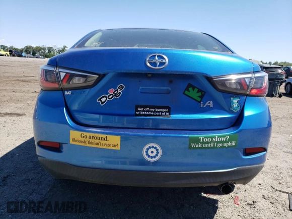 2016 Scion iA with VIN 3MYDLBZV0GY126458, listed as a Copart auction lot 57821414 with 89,427 mi miles and Salvage Title. Bid and sale history available at carsss.com. Image 6.