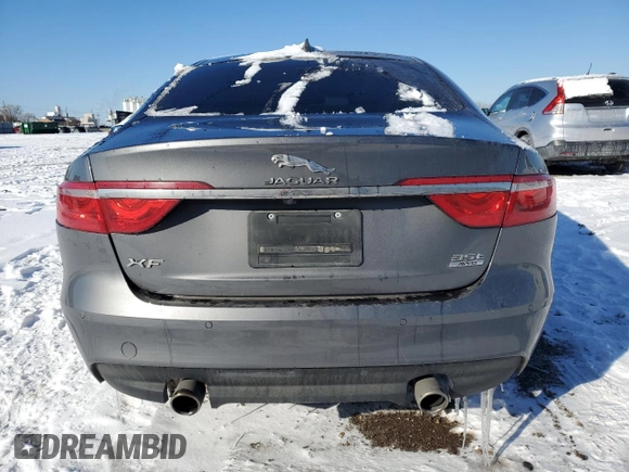 2018 Jaguar XF with VIN SAJBJ4EV6JCY56096, listed as a Copart auction lot 86593884 with 56,896 mi miles and Salvage Title. Bid and sale history available at DreamBid. Image 6.