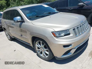 2014 Jeep Grand Cherokee Summit with VIN 1C4RJFJT5EC342050, listed as a IAAI auction lot 42816286 with 126,220 mi miles and . Bid and sale history available at DreamBid. Image 1.