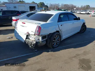 2014 Chrysler 300 with VIN 2C3CCAGT6EH286860, listed as a IAAI auction lot 41356345 with 87,658 mi miles. Bid and sale history available at carsss.com. Image 4.