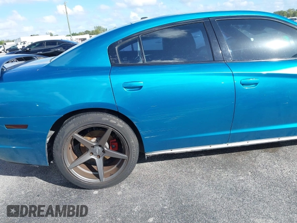 2012 Dodge Charger SXT with VIN 2C3CDXHG0CH185859, listed as a IAAI auction lot 40816799 with 132,572 mi miles. Bid and sale history available at carsss.com. Image 17.