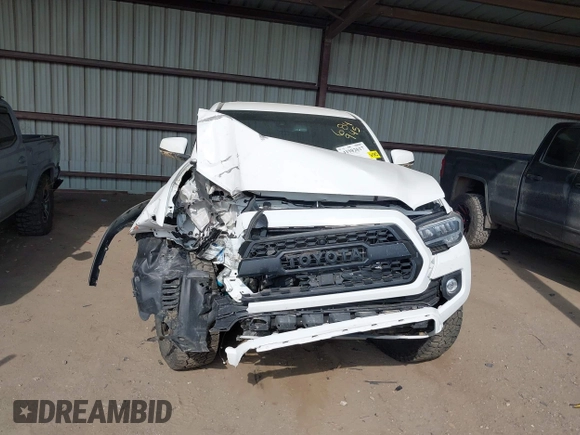 2021 Toyota Tacoma SR z VIN 3TMCZ5AN4MM373247, wystawiony jako IAAI lot #41982617 z przebiegiem 45 692 mil mil oraz . Historia ofert i sprzedaży dostępna na DreamBid. Obrazek 12.