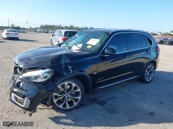 2018 BMW X5 xDrive40e iPerformance with VIN 5UXKT0C59J0W00801, listed as a IAAI auction lot 41081133 with 63,265 mi miles. Bid and sale history available at carsss.com. Image 18.