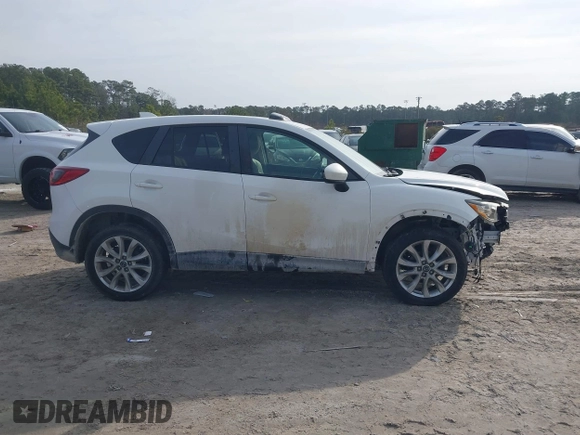 2014 Mazda CX-5 Grand Touring with VIN JM3KE4DY0E0343777, listed as a IAAI auction lot 41464395 with 126,214 mi miles. Bid and sale history available at carsss.com. Image 13.