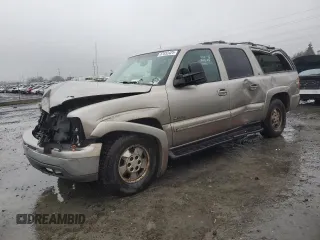 2000 Chevrolet Suburban LS with VIN 3GNFK16TXYG205867, listed as a Copart auction lot 87032424 with 307,632 mi miles and Salvage title. Bid and sale history available at DreamBid. Image 1.