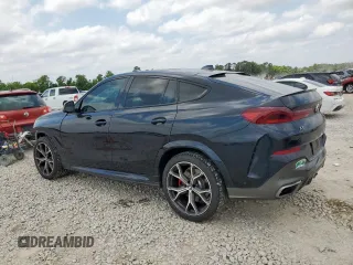 2022 BMW X6 M50i z VIN 5UXCY8C09N9J10045, wystawiony jako Copart lot #57225715 z przebiegiem 54 024 mil mil oraz Szkoda całkowita • Salvage title. Historia ofert i sprzedaży dostępna na DreamBid. Obrazek 2.