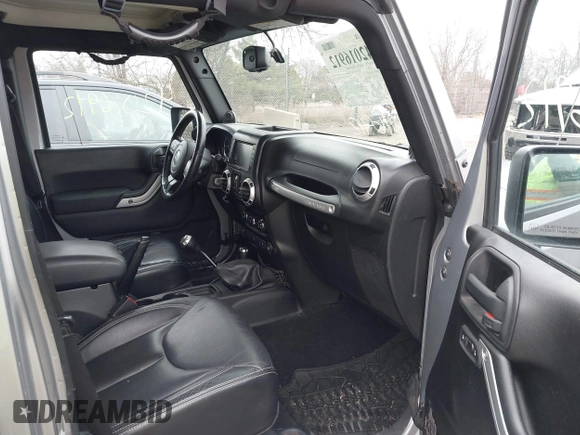 2013 Jeep Wrangler Unlimited Rubicon z VIN 1C4BJWFG7DL667083, wystawiony jako IAAI lot #42016912 z przebiegiem 148 933 mil mil oraz . Historia ofert i sprzedaży dostępna na DreamBid. Obrazek 5.