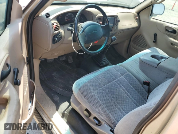 2000 Ford F-150 XL with VIN 1FTZF172XYNB65958, listed as a Copart auction lot 59946145 with 208,988 mi miles and Salvage title. Bid and sale history available at DreamBid. Image 8.