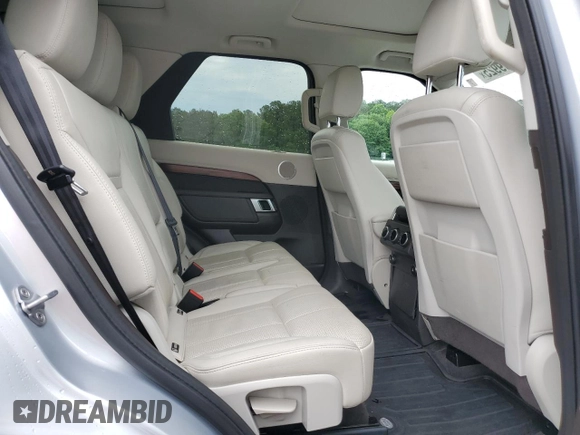 2018 Land Rover Discovery HSE z VIN SALRR2RV9JA071841, wystawiony jako Copart lot #57909925 z przebiegiem 112 020 mil mil oraz Czysty tytuł • Clean title. Historia ofert i sprzedaży dostępna na DreamBid. Obrazek 11.
