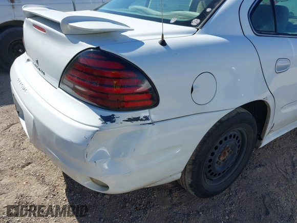 2005 Pontiac Grand Am SE with VIN 1G2NE52E05M215976, listed as a IAAI auction lot 42025657 with 220,418 mi miles. Bid and sale history available at carsss.com. Image 6.