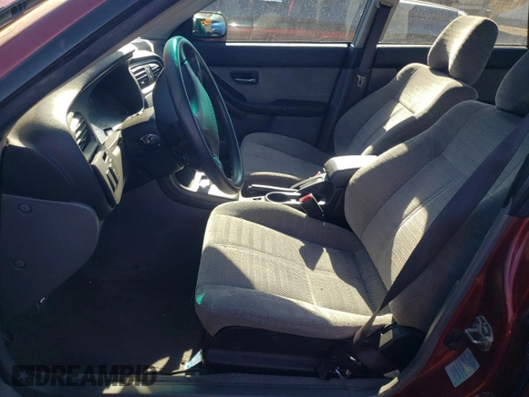2002 Subaru Legacy L with VIN 4S3BH635X27304636, listed as a Copart auction lot 77674424 with 159,785 mi miles and Salvage title. Bid and sale history available at DreamBid. Image 7.