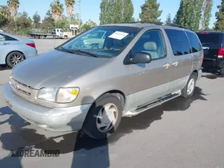 2000 Toyota Sienna LE with VIN 4T3ZF13C9YU189305, listed as a IAAI auction lot 42201168 with 218,254 mi miles and . Bid and sale history available at DreamBid. Image 2.