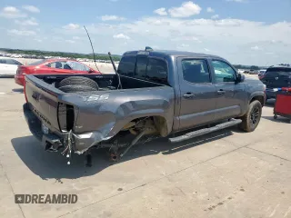 2021 Toyota Tacoma SR with VIN 3TYAX5GN8MT018185, listed as a Copart auction lot 59977895 with 68,149 mi miles and Salvage title. Bid and sale history available at DreamBid. Image 3.