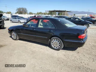 2001 Mercedes-Benz E-Class with VIN WDBJF65J51B386619, listed as a Copart auction lot 46623515 with 108,209 mi miles and Salvage Title. Bid and sale history available at carsss.com. Image 2.