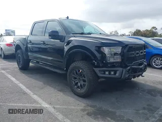 2020 Ford F-150 Raptor with VIN 1FTFW1RG2LFA30858, listed as a IAAI auction lot 42192391 with 90,018 mi miles and . Bid and sale history available at carsss.com. Image 1.