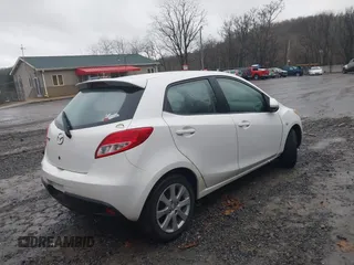 2012 Mazda 2 Touring z VIN JM1DE1LY4C0141202, wystawiony jako IAAI lot #41051663 z przebiegiem 160 364 mil mil oraz . Historia ofert i sprzedaży dostępna na DreamBid. Obrazek 4.