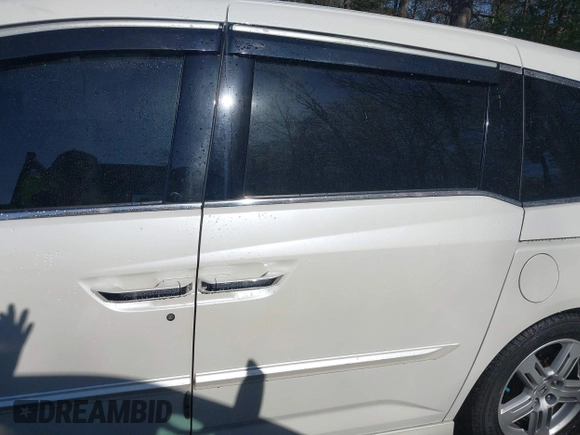 2012 Honda Odyssey Touring with VIN 5FNRL5H93CB146753, listed as a IAAI auction lot 41984850 with 155,309 mi miles and . Bid and sale history available at DreamBid. Image 14.