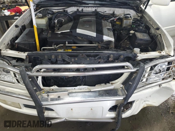 2000 Lexus LX 470 z VIN JT6HT00W9Y0109333, wystawiony jako Copart lot #47589965 z przebiegiem 261 766 mil mil oraz Szkody całkowita. Historia ofert i sprzedaży dostępna na DreamBid. Obrazek 12.