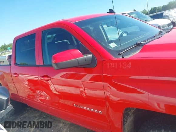 2018 Chevrolet Silverado 1500 LT with VIN 1GCUKREC0JF222376, listed as a IAAI auction lot 42121748 with 143,472 mi miles and . Bid and sale history available at DreamBid. Image 13.