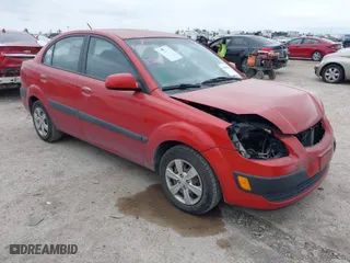 2008 Kia Rio LX with VIN KNADE123386354410, listed as a IAAI auction lot 40332735 with 139,828 mi miles. Bid and sale history available at carsss.com. Image 1.