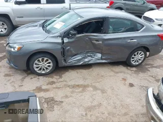 2019 Nissan Sentra S with VIN 3N1AB7AP9KY415350, listed as a IAAI auction lot 41059859 with 51,416 mi miles and . Bid and sale history available at DreamBid. Image 14.