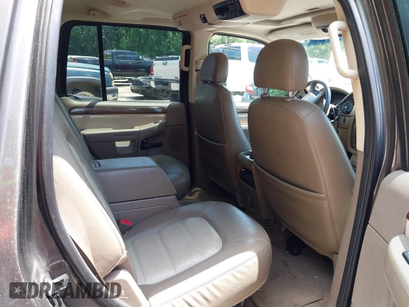 2005 Ford Explorer Eddie Bauer z VIN 1FMDU74W25UB59367, wystawiony jako IAAI lot #42604103 z przebiegiem 276 955 mil mil oraz . Historia ofert i sprzedaży dostępna na DreamBid. Obrazek 8.