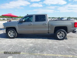 2017 Chevrolet Silverado 1500 LT with VIN 3GCPCREC1HG380406, listed as a IAAI auction lot 42031974 with 128,444 mi miles. Bid and sale history available at carsss.com. Image 14.