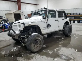 2012 Jeep Wrangler Unlimited Sport z VIN 1C4HJWDG7CL182017, wystawiony jako Copart lot #45001745 z przebiegiem 96 720 mil mil oraz Szkoda całkowita • Salvage title. Historia ofert i sprzedaży dostępna na DreamBid. Obrazek 1.