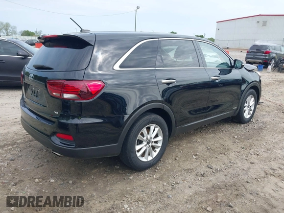 2019 Kia Sorento LX V6 with VIN 5XYPGDA55KG487091, listed as a IAAI auction lot 42007536 with 94,711 mi miles. Bid and sale history available at carsss.com. Image 4.