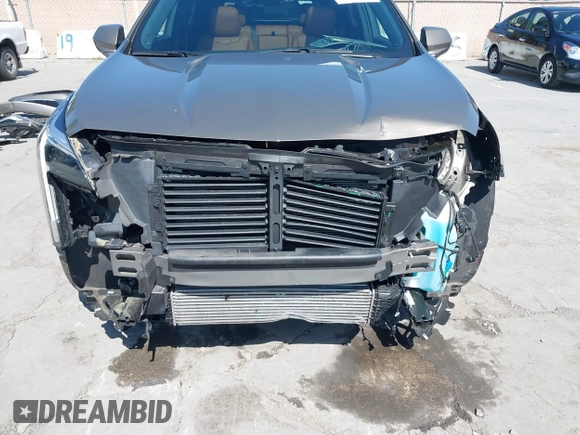 2020 Cadillac XT4 FWD Sport with VIN 1GYFZER4XLF032646, listed as a IAAI auction lot 42078928 with 11,987 mi miles and . Bid and sale history available at DreamBid. Image 6.