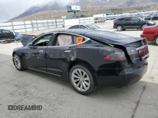 2016 Tesla Model S 90D with VIN 5YJSA1E23GF167938, listed as a Copart auction lot 51703075 with Not provided miles and Salvage title. Bid and sale history available at DreamBid. Image 2.