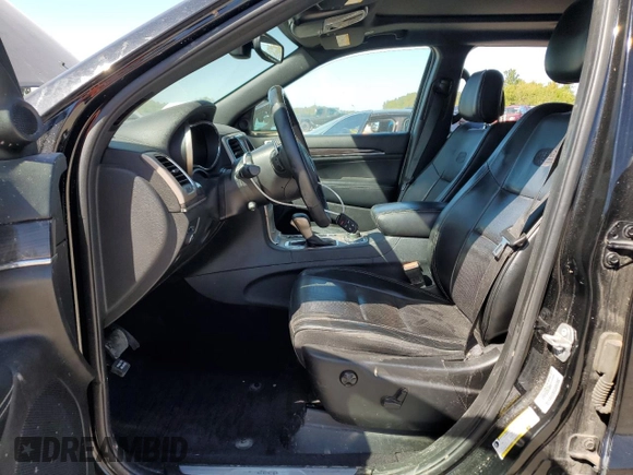 2017 Jeep Grand Cherokee Overland with VIN 1C4RJFCTXHC778491, listed as a Copart auction lot 73944594 with 99,235 mi miles and Clean Title. Bid and sale history available at carsss.com. Image 7.