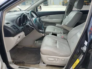 2006 Lexus RX 400h with VIN JTJHW31U462004213, listed as a Copart auction lot 58132875 with 202,326 mi miles and Salvage title. Bid and sale history available at DreamBid. Image 7.