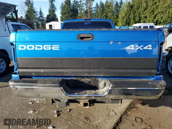 1999 Dodge Ram 2500 with VIN 3B7KF26Z0XM566658, listed as a Copart auction lot 82927584 with 0 mi miles and Salvage Title. Bid and sale history available at carsss.com. Image 6.