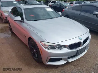 2015 BMW 4 Series 428i xDrive with VIN WBA4C9C50FD330482, listed as a IAAI auction lot 42116547 with 192,739 mi miles. Bid and sale history available at carsss.com. Image 1.