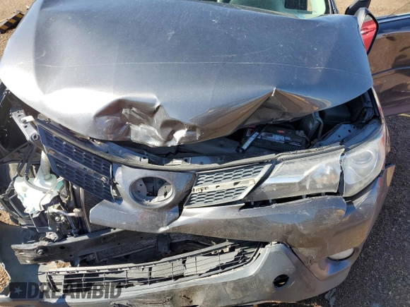2013 Toyota RAV4 Limited z VIN 2T3DFREV0DW009906, wystawiony jako Copart lot #60857305 z przebiegiem 150 944 mil mil oraz Szkoda całkowita • Salvage title. Historia ofert i sprzedaży dostępna na DreamBid. Obrazek 12.